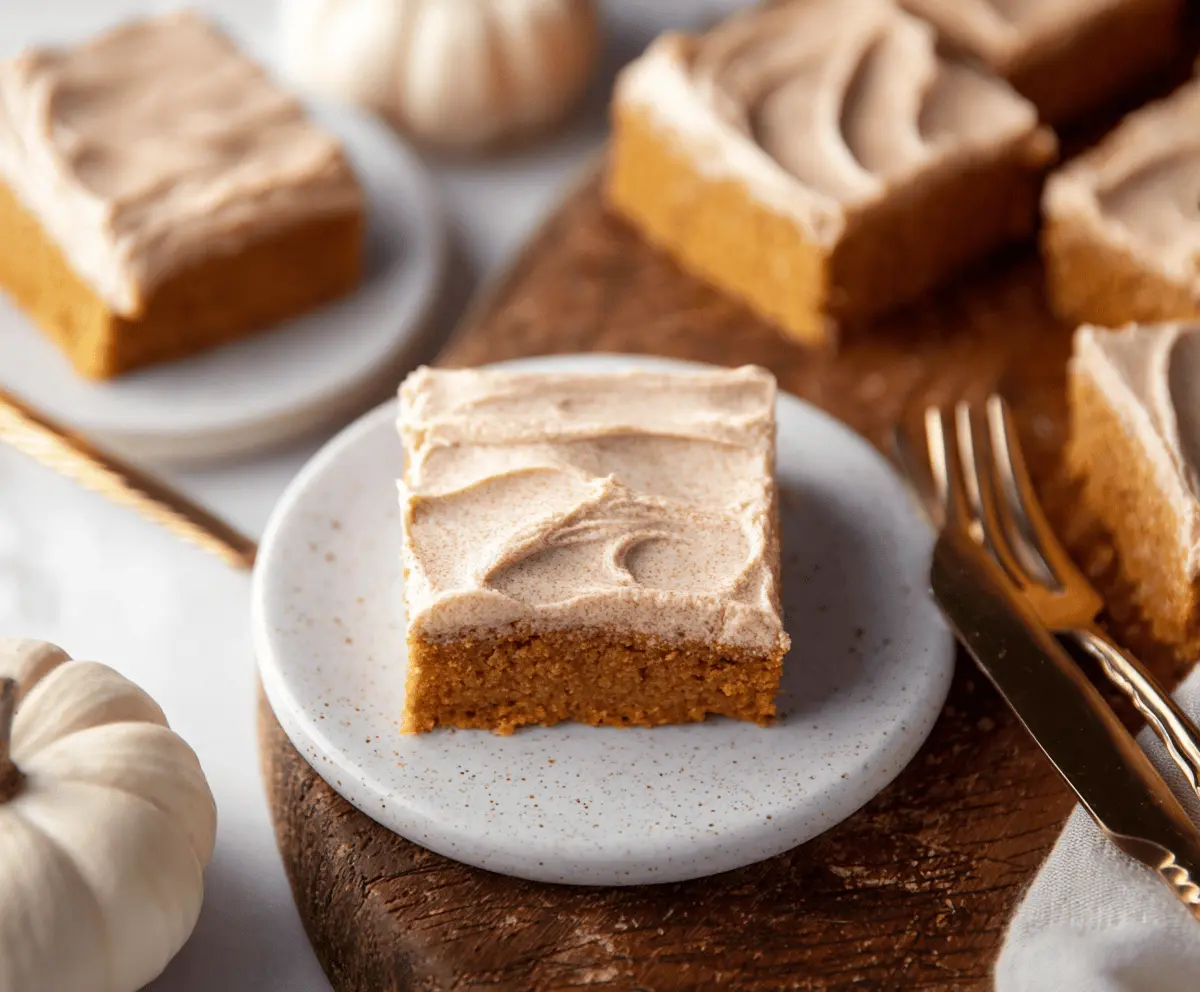 Delicious homemade pumpkin bars topped with creamy brown sugar frosting, perfect for fall desserts and holiday gatherings