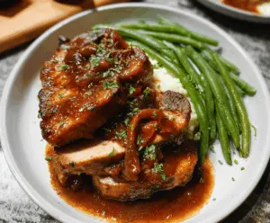 Juicy slow cooker pork chops with herbs and vegetables served on a plate, perfect for a flavorful dinner