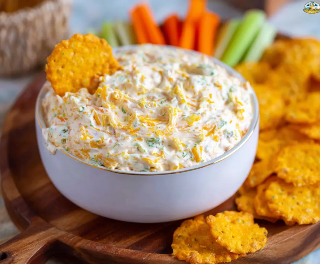 Creamy Cheddar Ranch Dip served with fresh vegetable sticks for a delicious appetizer.
