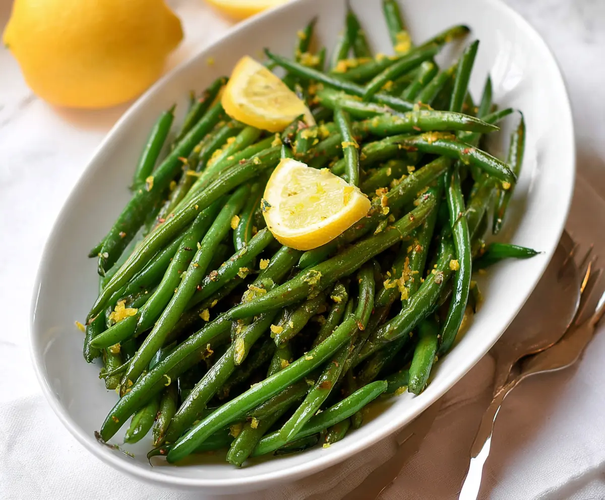 Fresh Lemon Green Beans dish served as a healthy side with bright lemon slices and tender green beans.
