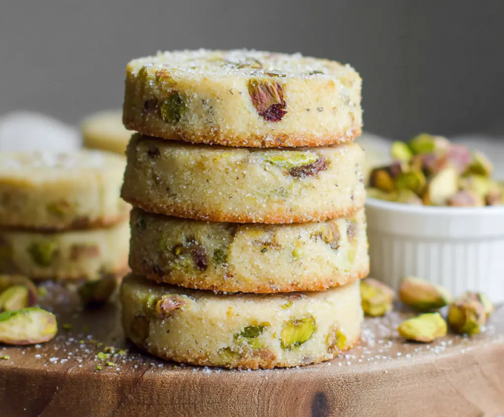 Delicious Pistachio Shortbread Cookies fresh out of the oven with a golden crust and crunchy texture.